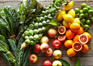 a group of fruits and vegetables on a wood surface Healthy Weight Loss Diets Wisley